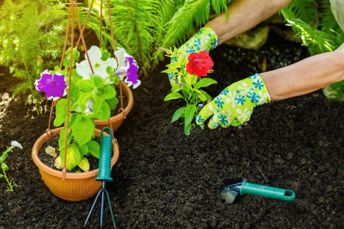 Gardener wearing PPE preparing tools